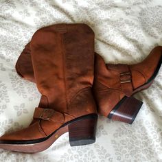 Brown Leather Boots With Buckle Accent. Never Worn. Purchased With Minor Flaw (Picture 6). Brown Moto Boots With Buckle Closure Medium Width, Brown Leather Moto Boots With Pointed Toe, Rustic Leather Boots With Pointed Toe, Brown Pointed Toe Boots With Buckle Closure, Western Style Leather High Heel Moto Boots, Brown Closed Toe Moto Boots With Buckle, Brown Snip Toe Boots With Buckle Closure, Vintage Leather Moto Boots With Pointed Toe, Brown Closed Toe Boots With Heel Loop