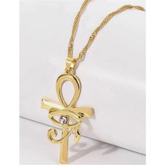 Twosret Ankh and Eye of Horus Necklace - Trufacebygrace Elegant Ankh-shaped Metal Jewelry, Gold Metal Cross Charm Necklaces, Gold Ankh Metal Jewelry, Gold Ankh Shaped Metal Jewelry, Gold Alloy Charm Necklaces For Gifts, Gold Alloy Charm Necklace As Gift, Gold Alloy Charm Necklace For Gift, Gold-plated Charm Necklace With Large Pendant, Gold Plated Charm Necklace With Large Pendant