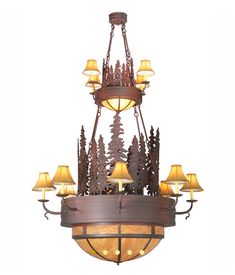 a large chandelier with many lights hanging from it's sides and pine trees on the bottom