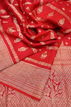 red and white banaram saree with gold border