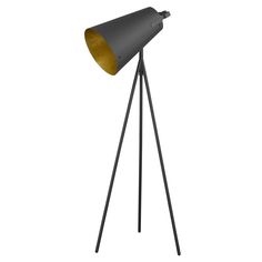 a black and gold floor lamp on a tripod with an orange light in the middle