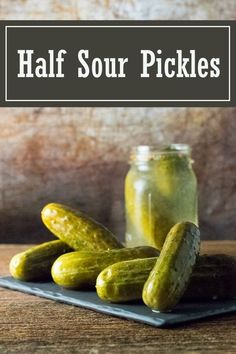 some pickles are sitting on a plate with the words half sour pickles above them