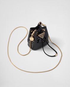 Black Patent Leather Mini-pouch | PRADA Designer Mini Bags, Mini Bags Aesthetic, Mini Prada Bag, Tas Celine, Prada Black Bag, Mini Black Bag, Small Bags Fashion, Prada Mini Bag, Mini Designer Bags