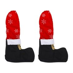 two christmas stockings with snowflakes on them are sitting in front of each other