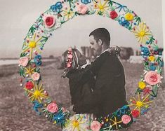 a man and woman are holding each other in front of a circular frame with flowers on it