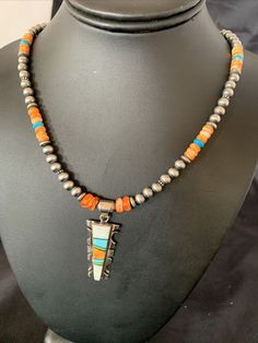 Masha Indian Native American Jewelry   -On Route 66 -         Albuquerque, New Mexico U.S.A     Item Specifics            Stone : Turquoise, Lapis & Spiny Oyster  Size : 20" Pendant Size : 2" Color : Blue, Denim Blue & Orange Artisan : O P SKU : 11801 Metal : Sterling Silver Metal Purity : 925 Regional Style : Native America Genuine Sterling Silver Jewelry  This beautiful Necklace is made from all 925 Sterling Silver Beads and Findings.  These Beads are meticulously hand strung and assembled by Southwestern Style Beaded Turquoise Pendant Necklace, Southwestern Style Multicolor Turquoise Pendant Necklace, Southwestern Beaded Turquoise Pendant Necklace, Southwestern Blue Necklace With Inlay, Multicolor Southwestern Turquoise Pendant Necklace, Southwestern Blue Turquoise Inlay Necklace, Multicolor Inlay Southwestern Necklace, Unique Sterling Silver Turquoise Inlay Necklace, Southwestern Silver Turquoise Inlay Necklace