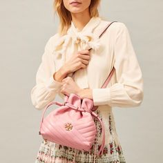 Nwt - Tory Burch Kira Chevron Mini Bucket Bag Brand New With Tags - Tory Burch Kira Chevron Mini Bucket Bag Color - Pink City Retail Value - $428.00 Made Of Soft Chevron-Quilted Leather With Beveled Double T Hardware. An Adjustable Crossbody Strap. Limited Edition Color. Height: 9.4” (23.5cm); Length: 8” (20cm); Depth: 4.4” (11cm) Magnetic Snap And Drawstring Closure Adjustable Crossbody Strap 1 Interior Zipper Pocket Dust Bag Included Tory Burch Kira Chevron, Kira Chevron, Mini Bucket Bag, Tory Burch Kira, Pink City, Mini Bucket Bags, Womens Designer Handbags, Mini Bucket, Designer Crossbody Bags