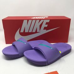 The Kids' Nike Kawa (Gs) Slide Features A Soft Synthetic Strap That Conforms To The Natural Movement Of Your Foot. Its Cushioned Platform Combines Plush Foam Underfoot With A Durable, Lightweight Outsole Foam For Long-Lasting Wear. Shaft Measures Approximately Low-Top From Arch Kids Sandals: Upgrade Your Sandals To These Nike Slide Sandals, Offering Both Style And Comfort For Everyday Wear In A Range Of Colors And Sizes. Synthetic Sandal Strap: Nike Slides Have A Soft Synthetic Strap That Confor Purple Synthetic Slides For Summer, Purple Non-slip Round Toe Sandals, Purple Non-slip Open Toe Sandals, Purple Cushioned Slip-on Sandals, Purple Synthetic Sandals With Cushioned Footbed, Purple Sandals With Cushioned Footbed, Purple Slip-on Slides For The Beach, Purple Slip-on Slides For Beach, Purple Slip-on Slides For Summer