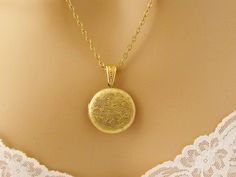 Locket Necklace, Gold Round Locket Necklace, Etched Photo Picture Necklace Floral, Mothers Day Gift Jewelry Christmas Birthday Gift Holds two 20 mm photos - Beautiful gold round locket etched with flowers and swirls holds 2 precious photos close to her heart. This timeless treasure will make a lovely gift for weddings, anniversary, Mothers Day, birthdays and other special occasions. This beautiful Art Nouveau/Victorian locket will become her go-to necklace for everyday wear. Length: 18 inches Lo Elegant Birthday Locket Jewelry, Valentine's Day Round Locket Necklace, Gold Round Locket Necklace For Mother's Day, Adjustable Gold Locket Necklace For Wedding, Personalized Gold Locket Necklace For Birthday, Vintage Round Disc Necklace For Gift, Vintage Round Disc Necklace As Gift, Valentine's Day Gift Round Locket Necklace, Round Locket Jewelry For Birthday