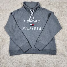 Tommy Hilfiger Pullover Womens Size Extra Large Grey Sweatshirt Logo Speel Out This Is Brand New With Tags. Size Xl Measurements: Length: 23" Pit To Pit: 24-1/2" A9-206 Casual Tommy Hilfiger Winter Tops, Casual Tommy Hilfiger Tops For Winter, Winter Casual Tops By Tommy Hilfiger, Casual Winter Tops By Tommy Hilfiger, Trendy Tommy Hilfiger Tops For Fall, Tommy Hilfiger Letter Print Tops For Fall, Cut Out Hoodie, Tommy Hilfiger Hoodie, Tommy Hilfiger Top