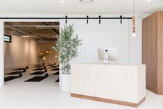 an office with black and white checkered flooring