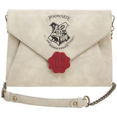 a harry potter envelope with a hogwarts wax seal on it