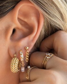 Just-the-right-size chunky hoops that add texture and flair to any ear combo - bold, statement earrings that are anything but boring. 14k Gold Vermeil Hypoallergenic, safe for sensitive ears Diameter: 19 mm Make your jewelry last! Click here for jewelry care. Need a gift box? We got you. Chunky Earring Stack, Earring Stacks Gold, Chunky Gold Earrings, Bali Earrings, Chunky Earrings, Prom Jewelry, Girl Jewelry, Stacked Jewelry, Jewelry Lookbook