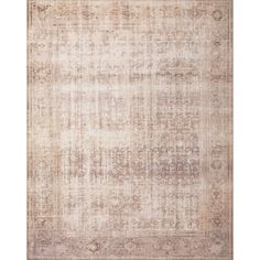 an antique style rug with faded colors and patterns on the bottom, in neutral tones