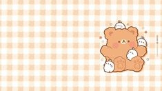 a brown teddy bear sitting on top of a checkered tablecloth with its paws in the air