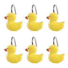 six yellow rubber ducks hang on hooks