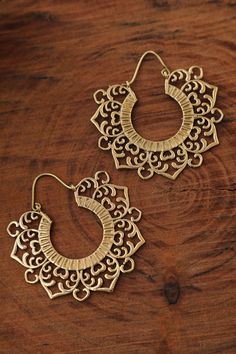 Intricate Brass Hoop Earrings, Festive Brass Hoop Earrings With Intricate Design, Gold Brass Drop Cartilage Earrings, Festive Brass Hoop Earrings With Ear Wire, Festive Brass Pierced Plug Earrings, Bohemian Brass Earrings With Ear Wire, Bohemian Small Hoop Copper Earrings, Bohemian Copper Hoop Jewelry, Gold Metal Plug Earrings For Festivals