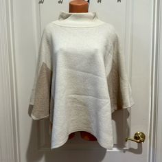 Note Di Anita Cashmere Blend Poncho Nwot Made In Italy $129 Osfa Xl L M S Xs New Without Tags Mock Neck Dolman Style Sleeve Openings Colorblock Ivory Tan Wool Viscose Nylon Cashmere Blend One Size Fits All Beige Poncho For Spring Layering, Beige Poncho For Layering, One Size Beige Poncho For Layering, Beige One Size Batwing Sleeve Tops, One Size Beige Batwing Sleeve Top, Beige Batwing Sleeve Poncho For Fall, Cream Cozy Poncho, Beige One-size Tops For Fall, Cozy Cream Poncho