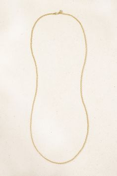 Carolina Bucci's necklace is hand-cast from 18-karat gold and made up of rolo links. It has a long, 33-inch length that's ideal for stacking with shorter styles. Wear it solo or with a few of your favorite pendants strung on. Yellow Gold Jewelry With Delicate Rectangular Links Chain, Minimalist Long Yellow Gold Chain Necklace, Minimalist Yellow Gold Long Chain Necklace, Minimalist Necklace With Rolo Chain And Oval Link, Fine Jewelry Rolo Chain Necklace As Gift, Fine Jewelry Rolo Chain Necklace For Gift, Minimalist Necklace With Rolo Chain, Adjustable Yellow Gold Chain Necklace In Recycled Gold, Yellow Gold Delicate Long Chain Necklace