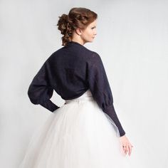 This handmade bolero has dark blue color. Bolero is made of soft mohair yarn. This bolero has puff sleeves. It will look good with any type of clothing, it will be amazing with any type of bridal and bridesmaids dress and will keep your shoulders warm. Made from high quality Italian yarn. Measurements: for size XXS Underarm 38 cm = 15 in Sleeve width at top (lying flat-unstretched): 38 cm = 15 in Sleeve length on inside seam: 47 cm = 18.5 in Sleeve width under elbow 18 cm = 7.1 in (unstretched) Bolero Jacket Wedding, Mint Jacket, Mohair Sweater Knit, Wedding Bolero, Sleeve Bolero, Bridal Shrug, Wedding Shrug, Bridal Cover Up, Bolero Wedding