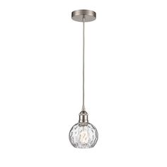 a light fixture with a glass ball hanging from it's side, on a white background