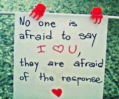 a sign on a clothes line that says no one is afraid to say i love you they are afraid of the response