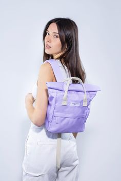 Enjoy everything you love about our classic Hackney Backpacks in a smaller size. Made from 100% recycled materials, our Mini Backpack is perfect for festivals, commutes, and daily use. With smart features like an anti-theft pocket and a key hook, this compact backpack combines style with practicality, making it a chic accessory for any occasion. Small in size, big on function and stylish enough to take anywhere, these bags are the cutest accessory for stashing your essentials on the go! FEATURES Trendy Anti-theft Backpack For Everyday Use, Trendy Anti-theft Everyday Backpack, Trendy Cotton Backpack For Everyday, Trendy Cotton Everyday Backpack, Recyclable Travel Bag For Back To School, Everyday Cotton Backpack With Adjustable Strap, Casual Everyday Backpack With Anti-theft, Trendy Cotton Backpack For Everyday Use, Practical Everyday Backpack With Adjustable Straps