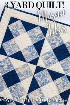 a blue and white quilt with the words 3 yard quilt