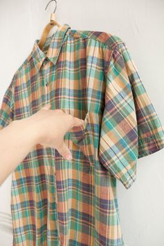 "Vintage Plaid Shirt Mens L Short Sleeves Check Shirt L Oversized Gingham Overshirt Checkered Womens Shirt XL Checked Top 90s Clothing L XL <---MEASUREMENTS---> Taken from seam to seam while the garment is lying flat.  Double bust, waist, sleeve and bottom hem! Bust: 25.2\" / 64cm ( armpit to armpit )  Shoulder to shoulder: 20.9'' / 53cm  Waist: 24.4'' / 62cm  Bottom hem: 24.8\" / 63cm  Shoulder: 7.1'' / 18cm  Sleeve length: 10.2\" / 26cm ( from shoulder )   Sleeve hem: 8.9\" / 22.5cm    Length: 90s Clothing, Half Sleeve Shirts, Cute Notes, Womens Shirt, Summer 24, Vintage Plaid, Shoulder Sleeve