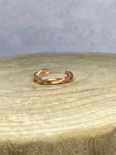 100% Copper ring. Twisted/Braided copper detail. Slightly adjustable. All handmade. Copper has amazing benefits for our overall health and functioning in life. Copper is helpful for balance, communication, and synchronicity. Copper is a great conductor of energy and is useful for all types of spiritual purposes. Many use Copper to balance the Chakras and Meridians. Check out my other listings for other bracelets, including copper, aluminum and beaded: https://www.etsy.com/shop/JGZDesigns?ref=sho Double Braid, Copper Ring, Overall Health, Copper Rings, Twist Braids, Handmade Copper, Minimalist Rings, Adjustable Ring, Adjustable Rings