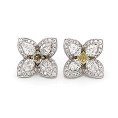 Flower inspired with center stone made up of square cut fancy yellow diamonds 1.35 ct in total. Accented by round cut diamonds 4.87 ct in total. Diamonds are white and natural and in G-H Color Clarity VS. Platinum 950 metal. French / Omega clips. Length: 1.8 cm Width. 1.8 cm Weight: 16.27 g [shortcode] [video] [/video] [/shortcode] Yellow Diamond Earrings With Diamond Accents, Yellow Diamond Earrings In Fine Jewelry Style, Fine Jewelry Yellow Diamond Earrings, Yellow Diamond Earrings With Diamond Accents For Wedding, Yellow Diamond Earrings With Accents For Wedding, Wedding Yellow Diamond Earrings With Accents, Yellow Diamond Earrings With Prong Setting, Earring Luxury, White Gold Hoop Earrings