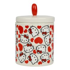 a hello kitty canister with red hearts on it