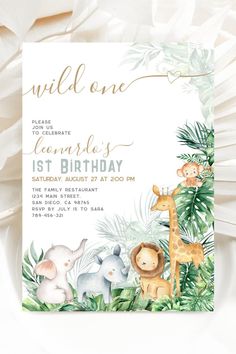 an animal themed birthday party with white paper and gold foil on the front, featuring jungle animals