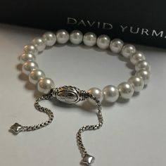 I Buy David Yurman Bead Bracelet To Restore Them, And Make Them Look And Feel Like Brand New. Then Sell Them To Be Able To Support My Family Economically. It Comes It A David Yurman Pouches Elegant Beaded Rosary Bracelet, Luxury Beaded Pearl Bracelet For Formal Occasions, Luxury Beaded Pearl Bracelet, Elegant Adjustable Rosary Bracelet With 8mm Beads, Elegant Pearl Bracelet With Silver Beads, Luxury White Beaded Pearl Bracelet, Formal White Hand-strung Jewelry, Luxury Pearl White Beaded Bracelets As Gift, Elegant Pearl White Bracelets With 8mm Beads