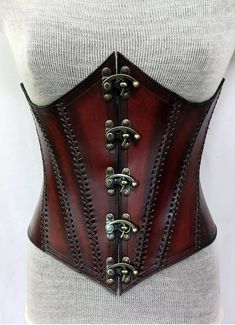 It is handmade leather underbust corset with hand-sewn leather detailing. It's adjustable back side with buckles. We used about 2 to 2.2 mm thick handmade leather. It is hand dyed handmade leather. It is crazy for medieval events and Larp.   Corset is hand made from sturdy top-grain leather.  Size is available from 30 to 46 inch, please check our size chart. DETAILS: ► 100% Handmade ► 100% Genuine leather ► Made on your measurements ► Unique design ► LARP standard ► Worldwide delivery Usually it Gothic Leather Corset Belt, Steampunk Leather Corset Belt For Cosplay, Steampunk Leather Corset For Cosplay, Gothic Leather Corset For Cosplay, Gothic Underbust Corset With Belt, Gothic Leather Corset Belt For Larp, Gothic Corset With Belt For Cosplay, Fitted Leather Medieval Corset, Medieval Leather Fitted Corset