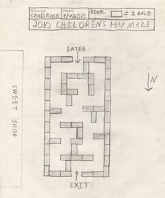 this is a drawing of a maze in the middle of a paper with an arrow pointing to it