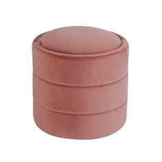 a pink round ottoman sitting on top of a white floor