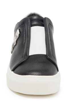 A stretchy-gore panel makes this colorblock sneaker easy to slip in and out of, while a tiny Karl pin punctuates the leather for a touch of attitude. Leather, textile, rubber and metal upper/synthetic lining/rubber sole Imported Black Synthetic Sporty Slip-ons, Modern Black Slip-on Sneakers With Removable Insole, Leather Slip-on Sneakers For Spring Sports, Sporty Leather Slip-ons For Sports, Modern Synthetic Slip-on Sneakers, Modern High-top Slip-on Sneakers With Contrast Sole, Modern Low-top Slip-on Sneakers With Removable Insole, Trendy Slip-on Sneakers With Branded Insole, Trendy Leather Slip-on Sneakers