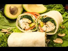 a salad wrap with chicken, lettuce, and avocado on it