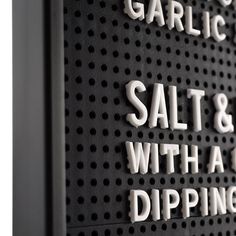 the words salt and with a diping are written in white on a black background