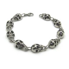 Stainless Steel Skull Bracelet, Highly Polished With Intricate Detailing. Excellent Quality.Made Of Surgical Steel. Will Not Tarnish Or Change Your Skin Colors. *Available In 7" - 10" Long *Approx. Weight: 43 Grams *Approx. Width: 10mm *Condition: Brand New *Gift Box Included With Purchase Edgy Stainless Steel Bracelets As Gifts, Punk Style Nickel Free Silver Bracelet, Punk Style Nickel Free Metal Bracelet, Edgy Metal Jewelry With Skull Print, Nickel Free Metal Punk Bracelets, Black Sterling Silver Chain Bracelet, Silver Stainless Steel Jewelry With Skull Print, Silver Skull Print Bracelets As A Gift, Edgy Silver Skull Jewelry