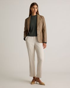 Introducing the ultimate statement piece - our sleek and stylish Leather Blazer. Crafted from the finest, 100% top grain sheep leather, this blazer is the epitome of luxury and sophistication. With its classic cut and timeless design, it's the perfect choice for any occasion, from a casual night out to a formal event. Meet the best way to elevate your style and add a touch of luxury to your wardrobe. Read more about what makes our leather special in our Leather 101 guide.  | Quince | Women's Blazer in Woodstock, Size XL, Leather Chic Structured Blazer With Pressed Crease, Luxury Tailored Leather Jacket For Semi-formal Occasions, Elegant Structured Blazer With Concealed Placket, Chic Structured Blazer With Boning, Chic Office Blazer With Structured Boning, Elegant Structured Blazer For Fall, Chic Formal Blazer With Pressed Crease, Elegant Fall Blazer With Concealed Placket, Chic Structured Notch Lapel Blazer