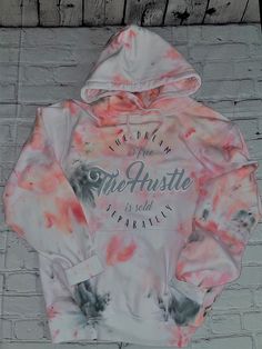 BEST SELLER ALERT This sweatshirt is our #1 top seller at the moment, it's easy to see why! Snuggle into our cozy hoodie, it's a marbled, crinkled ice tie-dyed pattern. Hints of tiny color everywhere, it's quite magical. This is a *one of a kind* tie-dye crewneck hoodie, no two are EVER alike. It pairs well with jeans or leggings. Premium Vinyl is used for lettering/design. No fading! Our sweatshirts are: - pre-shrunk 50/50 cotton/polyester. - Air jet yarn = softer feel and reduced pilling. - No Acid Wash Tops With Drawstring Hood And Relaxed Fit, Acid Wash Top With Drawstring Hood And Relaxed Fit, Relaxed Fit Acid Wash Top With Drawstring Hood, Acid Wash Hooded Top For Spring, Tie Dye Graphic Print Hoodie, Tie-dye Hoodie With Drawstring Hood, Winter Tie Dye Hoodie Top, Hooded Tie-dye Cotton Tops, Tie Dye Cotton Top With Drawstring Hood