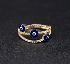 "14k Real Solid Yellow Gold Evil Eye Ring, 14k Solid Gold Women Dainty Ring, Evil Eye Gold Ring for Women,14k Evil Eye Gold Ring, Minimalist Ring * Metal : Real 14K Yellow Gold, (Properly Stamped, 14K) * Condition : Brand New * Finish : Polished * Band thickness:2.6 mm * Scale: : 6,5US, 7US, 7.5US * Stone: Cubic Zirconia These Rings are 100% Authentic 14K Solid Real Gold . \"Not Plated or Filled\" This is a Beautiful Genuine Real 14K Solid Gold Evil Eye Ring BOSPHORUSGOLD" Yellow Gold Evil Eye Round Ring, Yellow Gold Evil Eye Jewelry For Anniversary, Yellow Gold Evil Eye Ring, 14k Gold Evil Eye Ring, Gold Rings With Evil Eye For Gift, Gold Evil Eye Ring As A Gift, Gold Evil Eye Ring Gift, Yellow Gold Evil Eye Rings As Gifts, Gold Evil Eye Promise Ring