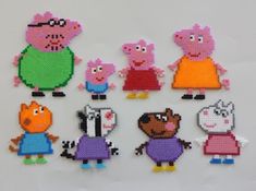 a group of pixelated peppa pig characters