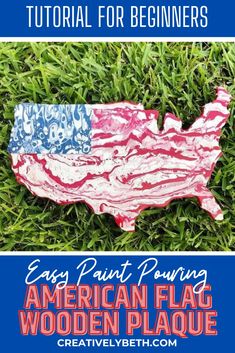 an american flag painted on the grass with text overlay that reads easy paint pouring american flag wooden plaque