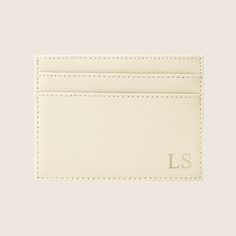 a white card holder with the letter ls on it's front and side