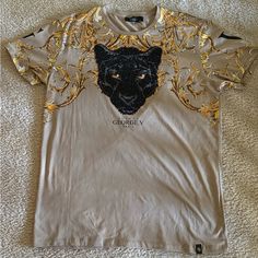 Beige Panther T-Shirt By Avenue George V Paris. Size Xxl But Fits Like A Size Xl. In Excellent Condition, Never Worn! Gold Graphic Print Short Sleeve Top, Gold Short Sleeve Tops With Graphic Print, Gold Graphic Tee Tops For Summer, Paris Shirts, George V Paris, Paris Shirt, Panther, Colorful Shirts, Tee Shirts