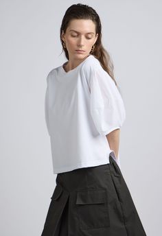 One Size. Fits XS-XLColor: White Puff SleeveRegular FitSplit Waist DetailDesigned for Casual FitLightweight Fabric80% Cotton 20% NylonDry Clean OnlyBy The NKC StoreProduct Measurements:Bust: 118.87cm / 46.8inLength: 53.97cm / 21.25in White Puff Sleeve Trendy T-shirt, White Boxy Fit Cropped T-shirt, Affordable White Puff Sleeve T-shirt, Boxy White Cotton T-shirt, White Cotton T-shirt With Contrast Panels, Casual Fit, Mens Outerwear, Casual Fits, Pleated Skirt