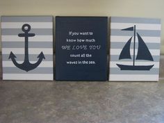 three canvases with sailboats and an anchor are on the floor in front of a wall